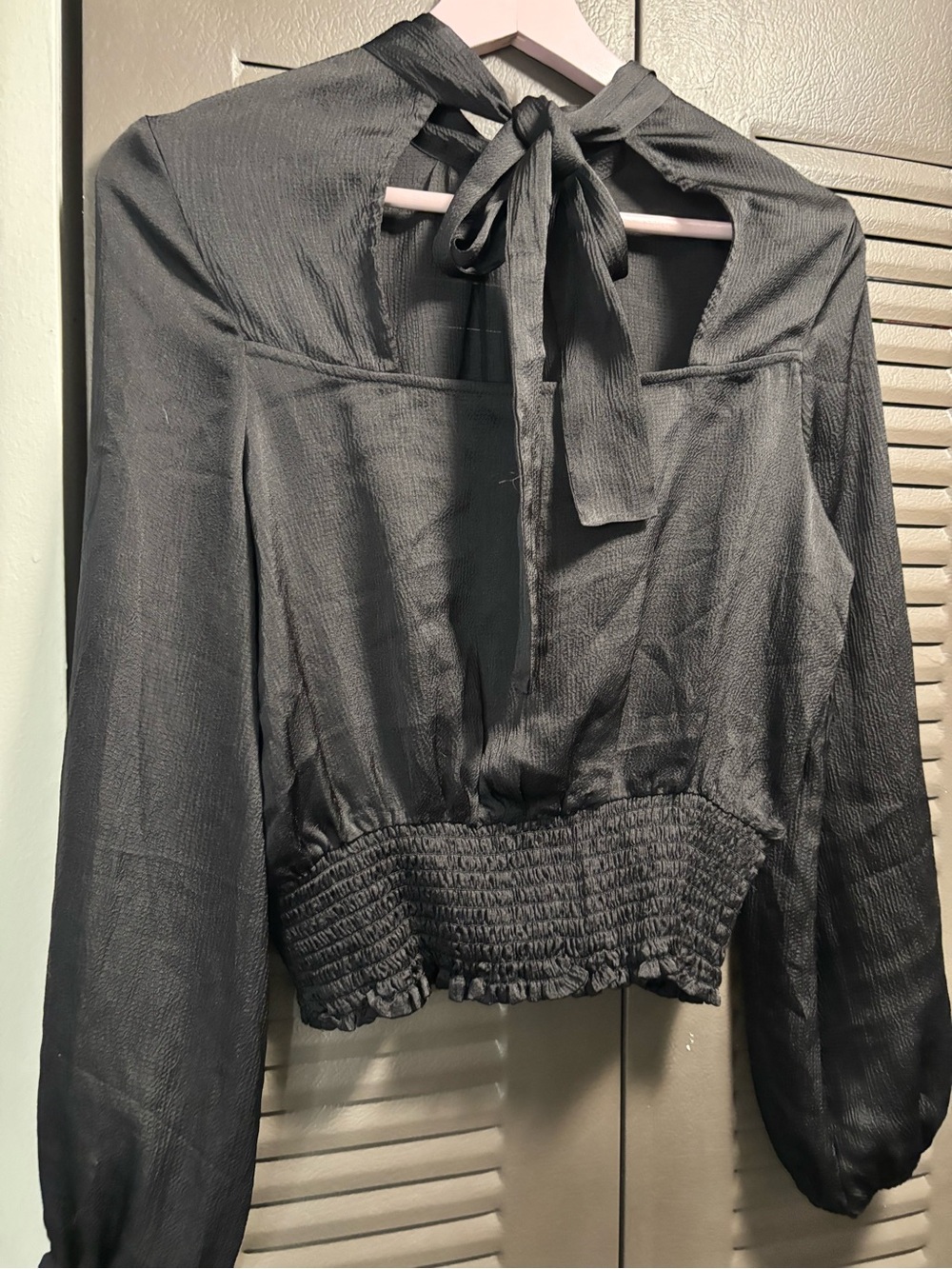 Francesca's Collections Black Tie-Back Smocked Waist Long Sleeve Top